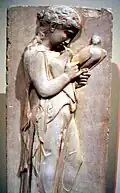 Greek bas-relief of girl with dove