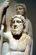 Greek couple in high relief