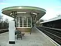 Looking north ('eastbound') along platforms 2 (right) and 3, with 1930s style shelter