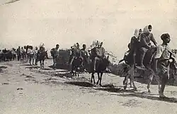 In 1922-23, the Near East Relief evacuated 22,000 children from ophanages in interior Turkey to Syria and Greece. This picture shows some of the 5,000 children from Karput en route on donkey back and foot.