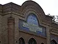ُSign of Faravahar at the top of Building