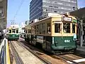 Hiroden cars 651 and 652, which survived the atomic bomb  and were still running in Hiroshima as of 2015
