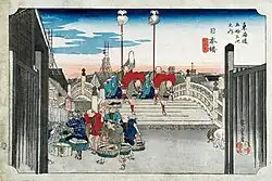 View of the Nihon-bashi at dawn, in a woodblock print by Hiroshige