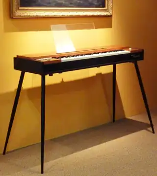 A Clavinet on a stand.