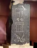 Serekh of Shoshenq V inscribed into black basalt with Horus animal partially removed