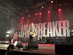 Jawbreaker playing in Denver, April 2022. Left to right: Bauermeister, Schwarzenbach, and Pfahler.