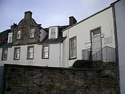 White painted stone cottage