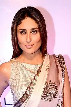 Kareena Kapoor smiling away from camera