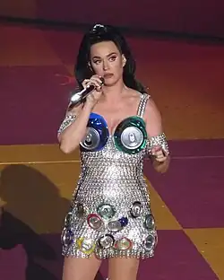 Perry holding a microphone