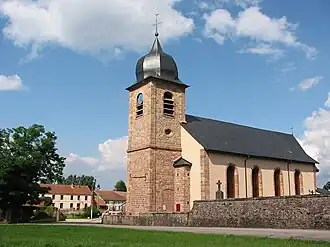 The town hall and the church of Saint-Denis in La Bourgonce