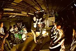 La Dispute playing in the United States of America in 2012. (from left to right) Adam Vass, Brad Vander Lugt, Jordan Dreyer, Kevin Whittemore.