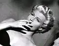 Rita Hayworth in film trailer; dyed blond.