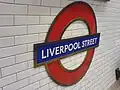 Westbound platform 3 roundel on Central line platform