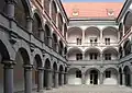 Arcades giving on a cosed square. This is the Münzhof in Munich