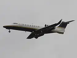 Learjet 45 flying, landing gear is out