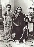 Woman and girl dressed in a Marathi sari