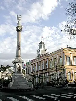 Saint-Denis's former city hall and the Column of Victory