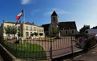 The town hall and church in Étréchy
