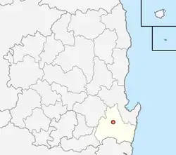 A region on an east coast is divided into 23 districts, with the southern coastal district highlighted.