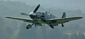 A Messerschmitt Bf 109 figher plane in flight