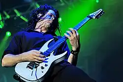 Chris Broderick playing the guitar
