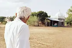 Faredoon Driver shows the grounds of Upper Meherabad.