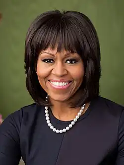 Official portrait of Michelle Obama in the Green Room of the White House