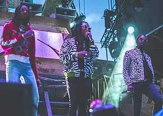 Migos performing at the 2017 Veld Festival (from left to right: Quavo, Takeoff, and Offset)
