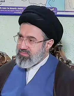 Ayatollah Khamenei, age 55, in clerical clothing