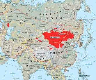 Topographic map showing Asia as centered on modern-day Mongolia and Kazakhstan. An orange line shows the extent of the Mongol Empire. Some places are filled in red. This includes all of Mongolia, most of Inner Mongolia and Kalmykia, three enclaves in Xinjiang, multiple tiny enclaves round Lake Baikal, part of Manchuria, Gansu, Qinghai, and one place that is west of Nanjing and in the south-south-west of Zhengzhou