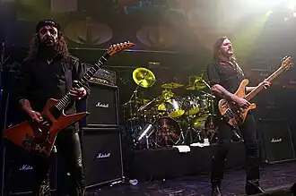 Left to right: Campbell, Dee, and Lemmy in 2005