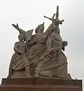 Women carrying guns and Communist signs