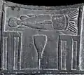 Serekh of Narmer, warranted by the existence of the catfish glyph, found on the siltstone Narmer Palette. An example of ancient Egyptian Dynasty 1 serekhs.