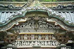 Close-up of carvings above Karamon Gate