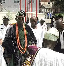 The Oba is a spiritual leader in Nigerian culture with the respect (status) of royalty. This was a ceremony celebrating the 50th anniversary of the Nigerian Navy.