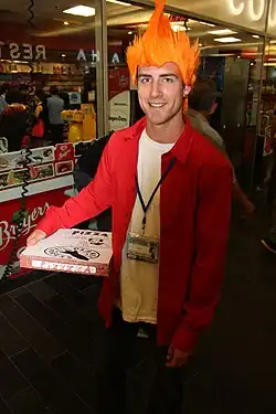 A cosplayer dressed up as Fry.