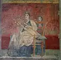 A Roman representation of a woman playing the cithara (Villa Boscoreale, ca. 40-30 BCE).