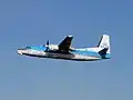 A KLM Cityhopper Fokker 50 taking off Amsterdam