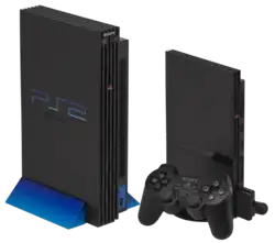 Slimline (right) and Original (left) PS2 consoles