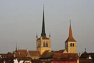 The towers of the Abbey and the Reformed church above Payerne