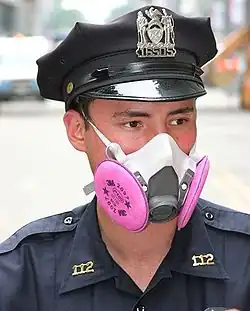 This is a person wearing an half-mask elastomeric respirator.