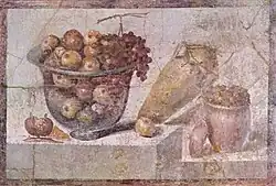 Transparent bowl of fruit and vases. Roman wall painting in Pompeii (around 70 AD)