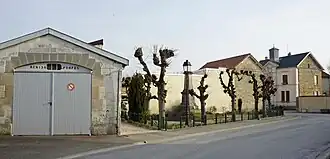 The fire station, war memorial and town hall in Saint-Germain-la-Ville