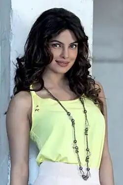 A photograph of Priyanka Chopra looking towards the camera
