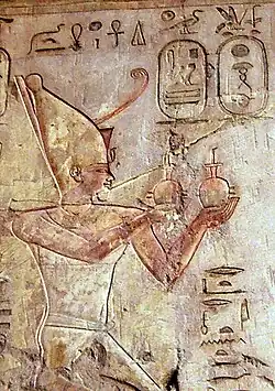 Relief of Psamtik I making an offering to Ra-Horakhty (Tomb of Pabasa) Yet his Succsedor Necho ii supports