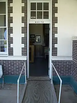 Door to the "white" bathroom at a railroad station (Florida)