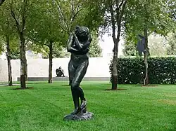Eve, discovering shame. Another version is in the background.