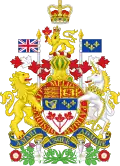 At the top there is a rendition of St. Edward's Crown, with the crest of a crowned gold lion standing on a twisted wreath of red and white silk and holding a maple leaf in its right paw underneath. The lion is standing on top of a helm, which is above the escutcheon, ribbon, motto and compartment. There is a supporter of either side of the escutcheon and ribbon; an English lion on the left and a Scottish unicorn on the right.