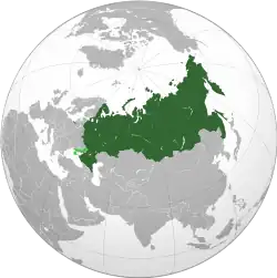 Russia on the globe. Disputed lands are shown in light green.