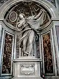 Saint Veronica carries the veil that she used to wipe the face of Jesus, when he was carrying his cross.